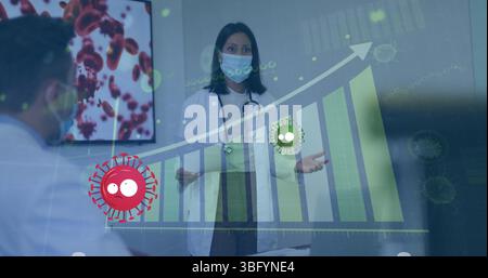 Image de cellules virales rouges et vertes sur médecin féminin dans le masque facial et graphiques Banque D'Images