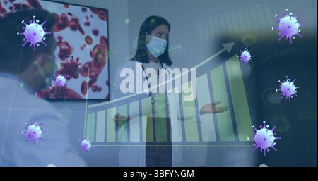 Image de cellules virales violettes sur médecin féminin dans le masque facial et graphiques Banque D'Images