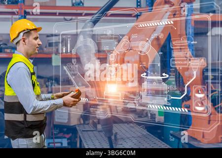 ingénieur professionnel, utilisant la technologie avancée dans l'opérateur de contrôle de machine de bras de soudage industriel de robot moderne d'usine Banque D'Images