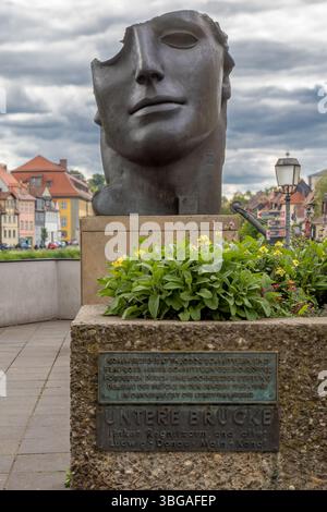 BAMBERG, BAVIÈRE, ALLEMAGNE - 24 MAI 2025 : CENTURIONE. La sculpture en bronze avec la moitié du visage représente la tête endommagée du Dieu grec de l'amour Eros. Banque D'Images