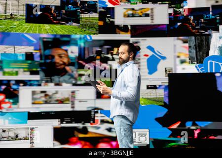 Créateur de contenu se connectant avec un public mondial des médias sociaux grâce à la technologie mobile, en utilisant des outils numériques pour la narration et la marque pour renforcer l'influence, l'engagement et la présence en ligne. Banque D'Images