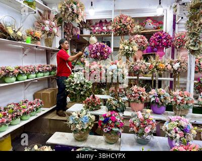 Fleuriste, Mercado Jamaica, l’un des marchés publics traditionnels de Mexico. CDMX, Mexique Banque D'Images