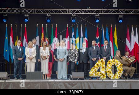 Schengen, Luxembourg. 14 juin 2025. Les politiciens des états membres de l'UE prennent la parole lors de la cérémonie marquant le 40e anniversaire de la signature de l'accord de Schengen. L'Allemagne, la France et les pays du Benelux ont signé l'accord de Schengen à Schengen (Luxembourg) sur la suppression progressive des contrôles des personnes à leurs frontières communes. Une cérémonie est organisée à Schengen sur la Moselle au Luxembourg pour marquer cet anniversaire, qui comprend l'ouverture du Musée européen nouvellement conçu. Crédit : Harald Tittel/dpa/Alamy Live News Banque D'Images