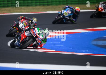 Misano Adriatico, Italie. 14 juin 2025. Alex LOWES (GBR) pour bimota by Kawasaki Racing Team au virage 16 lors de la course 1 de la 6e manche du WorldSBK PIRELLI EMILIA ROMAGNA 2025 au Misano World circuit à Misano Adriatico (Rimini, Italie). Le coureur britannique est arrivé en quatrième position. Crédit : Riccardo Righetti/Alamy Live News Banque D'Images