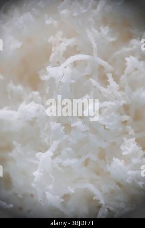 Macro photo de noix de coco râpée, mise au point sélective Banque D'Images