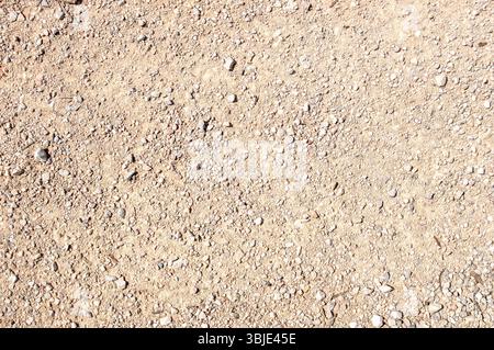 Texture de surface en gravier sec et terre pleine cadre. Banque D'Images