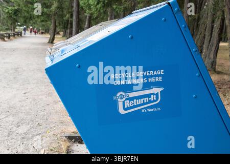 Panneau Return-it sur le bac de recyclage du parc provincial Rathtrevor Beach à Parksville, Colombie-Britannique, Canada Banque D'Images