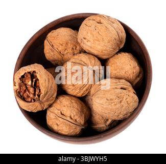 Noix dans un bol en céramique Banque D'Images