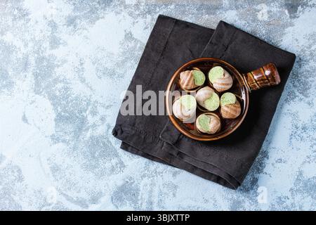 Escargots de Bourgogne escargots crus Banque D'Images