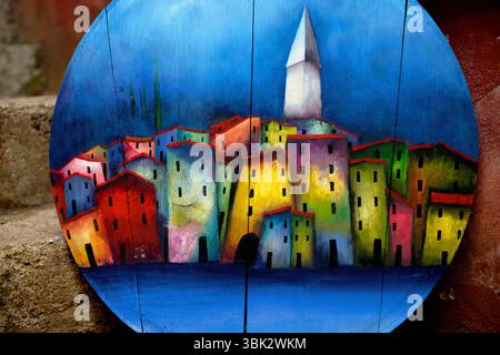 Petites maisons confortables sur la peinture à l'huile le soir Banque D'Images