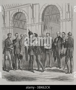 Guerre franco-prussienne (1870-1871). Le roi Guillaume Ier arrivant d'EMS, à la gare de Berlin, reçoit la nouvelle de la déclaration de guerre française (19 juillet 1870). Après l'avoir lu, il embrasse le prince royal, qui l'attendait avec Bismarck et les généraux Helmuth von Moltke, Albrecht von Roon et Friedrich von Wrangel. Gravure. Historia de la Guerra de Francia y Prusia (histoire de la guerre entre la France et la Prusse). Volume I. publié à Barcelone, 1870. Banque D'Images