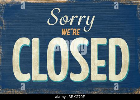 Affiche un panneau en bois de conception plate rustique avec des planches bleues ébréchées affichant Sorry WE'RE CLOSED Banque D'Images