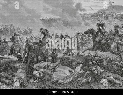 Bataille de Ligny, Belgique (16 juin 1815). Engagement entre les troupes françaises dirigées par Napoléon Ier et l'armée prussienne dirigée par Gebhard von Blücher. Conclu par une victoire française. Fin de la bataille de Ligny : le cheval du général Blücher est abattu pendant la charge des cuirassiers et tombe de lui. Dessin de Philippoteaux. Gravure de Pontenier. Histoire du Consulat et de l'Empire, par A. Thiers. Volume IV. publié à Barcelone, 1879. Banque D'Images