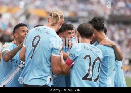 Orlando, États-Unis. 26 juin 2025. Les joueurs de Manchester City célèbrent le score lors du match du groupe G entre l'Italien Juventus FC et l'Anglais Manchester City lors de la Coupe du monde des clubs FIFA 2025 au Camping World Stadium, Orlando, États-Unis, le 26 juin 2025. Crédit : Huang Zongzhi/Xinhua/Alamy Live News Banque D'Images