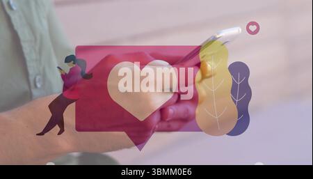 Tenant un smartphone, les mains affichant le cœur et la superposition de l'image des personnes Banque D'Images