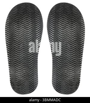Photo isolée de protecteur de chaussure à motif en caoutchouc de couleur noire sur fond blanc. Banque D'Images