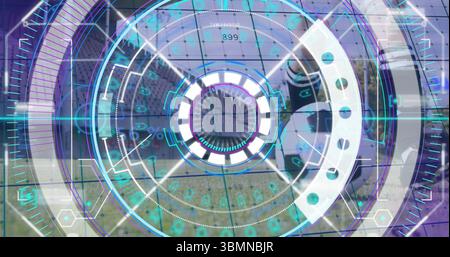 Affichage de l'interface HUD superposée au paysage aérien, avec des anneaux concentriques et des lectures numériques Banque D'Images