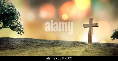 La conception plate représente une croix en bois debout sur une colline herbeuse sous le ciel doré avec des orbes bokeh Banque D'Images