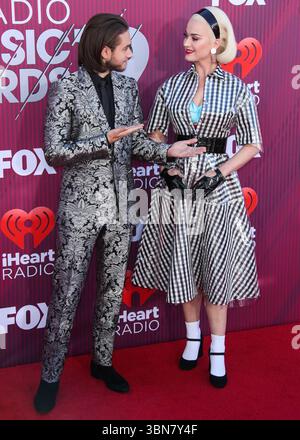 (FILE) Katy Perry et Orlando Bloom se sont séparés après près de 10 ans ensemble. LOS ANGELES, CALIFORNIE, États-Unis - 14 MARS : Zedd (Anton Zaslavski) et la chanteuse américaine, auteur-compositeur et personnalité de la télévision Katy Perry portant une robe Paskal, des gants Majesty Black, des boucles d'oreilles Vintage et des chaussures des collections Katy Perry arrivent aux iHeartRadio Music Awards 2019 qui se tiennent au Microsoft Theater at L.A. Live le 14 mars 2019 à Los Angeles, Californie, États-Unis. (Photo de Xavier Collin/image Press Agency) Banque D'Images