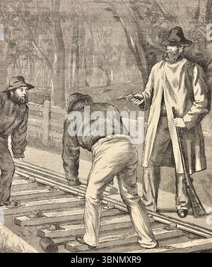 Ned Kelly attemps pour dérailler le train - 'The Kelly's à Glenrowan, se préparant à 'briser le train'' Banque D'Images