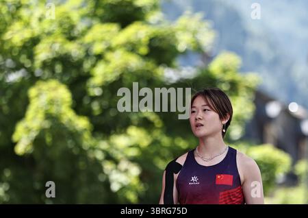 Charmonix, France. 12 juillet 2025. Luo Zhilu, de Chine, réagit après la qualification féminine de leader de l'escalade sportive lors de la Coupe du monde d'escalade IFSC 2025 en tête de vitesse à Charmonix, France, le 12 juillet 2025. Crédit : Gao Jing/Xinhua/Alamy Live News Banque D'Images