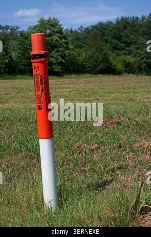 Poteau souterrain pour câble à fibres optiques Banque D'Images