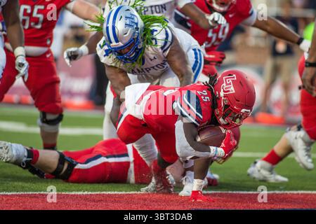 21 septembre 2019 : Liberty Flames Running Back Peytton Pickett (25 ans) plonge dans la zone finale pour marquer lors d'une action de football NCAA entre les Pirates de Hampton et les Liberty Flames au Williams Stadium de Lynchburg, Virginie. Jonathan Huff/CSM.(image de crédit : &copy ; Jonathan Huff/CSM via ZUMA Wire) Banque D'Images