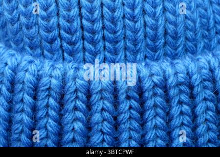 Fond bleu textile Grand tissu de laine tricotée, fond gros plan, macro photographie Banque D'Images