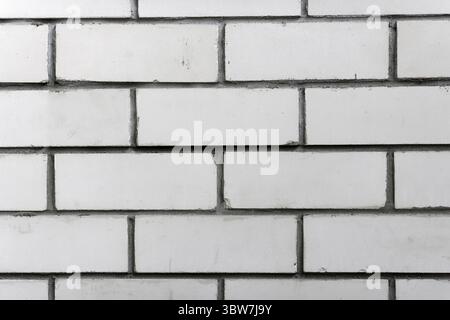 Arrière-plan abstrait. Gros plan sur le mur de briques blanches. Maçonnerie Banque D'Images