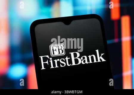 Canada. 16 juillet 2025. Dans cette illustration photo, le logo FirstBank (First Bank) est affiché sur l'écran d'un smartphone (Credit image : © Thomas Fuller/SOPA images via ZUMA Press Wire) USAGE ÉDITORIAL SEULEMENT ! Non destiné à UN USAGE commercial ! Banque D'Images