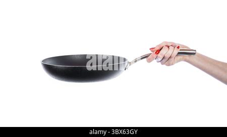 Femme hand holding poêle isolé sur fond blanc Banque D'Images