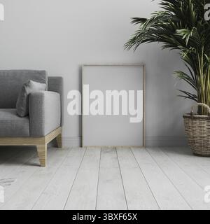 Maquette de cadre d'affiche verticale vierge debout sur plancher en bois blanc dans un intérieur minimaliste moderne clair avec mur blanc et canapé gris et palmier, SC Banque D'Images