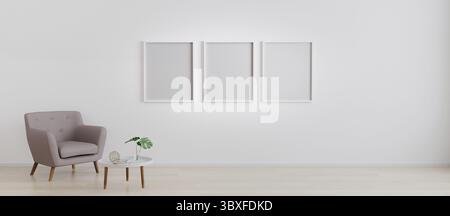 Trois cadres vides avec fauteuil avec table basse moderne blanche avec décoration dans une pièce lumineuse pour la maquette. Séjour avec 3 cadres vides pour maquette. Banque D'Images