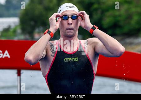 Singapour, Singapour. 19 juillet 2025. Florian Wellbrock, d'Allemagne, réagit après avoir concouru dans les 3km éliminatoires hommes de natation en eau libre lors des 22èmes Championnats du monde de natation à Sentosa à Singapour (Singapour), le 19 juillet 2025. Crédit : Insidefoto/Alamy Live News Banque D'Images