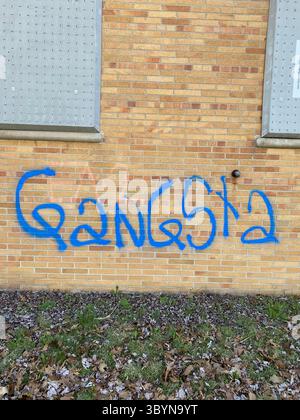 Les identifiants ETGC W7M comprennent les graffitis « ETGC », les bandanas bleus, les signes de main Crip et les tatouages marqués avec « SCRG », « ETG » et « W7M ». Banque D'Images