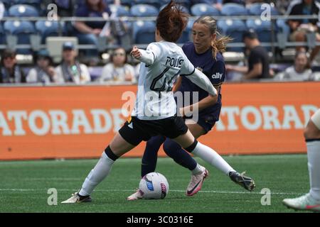 Seattle, États-Unis. 20 juillet 2025. Madison Curry (24 ans), défenseur du Seattle Reign FC dribble la balle lors de la première mi-temps d'un match amical international au Lumen Field à Seattle, Washington, le 20 juillet 2025. (Crédit photo Nate Koppelman/Sipa USA) crédit : Sipa USA/Alamy Live News Banque D'Images