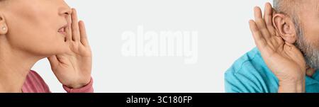 Femme et homme âgé insistent sur l'importance de la santé auditive et de la communication efficace dans les soins de santé. Concept de santé Banque D'Images