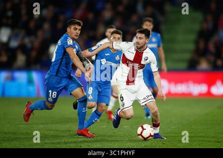 9 mars 2019 - Getafe, MADRID, ESPAGNE - moi Gomez de Huesca et Arambarri de Getafe pendant la ligue espagnole, la Liga, match de football joué entre Getafe CF et SD Huesca au stade Butarque de Getafe, Madrid, Espagne, le 9 mars 2019. (Crédit image : © AFP7 via ZUMA Wire) Banque D'Images