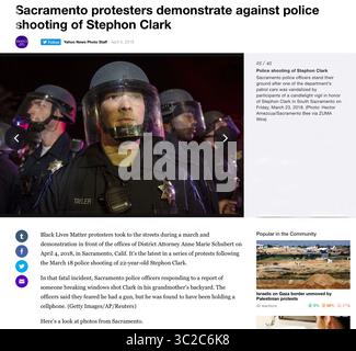 5 avril 2018 - Sacramento, Californie, États-Unis - les policiers de Sacramento tiennent leur sol après que l'une des voitures de patrouille du département a été vandalisée par les participants d'une veillée aux chandelles en l'honneur de Stephon Clark dans le sud de Sacramento vendredi. Clark n'était pas armé tenant son téléphone portable quand il a été abattu par la police de Sacramento dans la cour arrière de ses grands-parents. 23 mars 2018. (Crédit image : ©Hector Amezcua/Sacramento Bee via ZUMA Wire). Banque D'Images