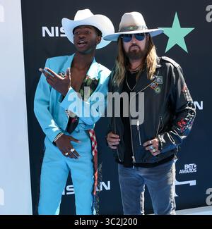23 juin 2019 - Los Angeles, Californie, États-Unis - Los Angeles, Californie, États-Unis - LIL NAS X et BILLY RAY CYRUS assistent aux BET Awards 2019 (crédit image : © Alexander Seyum/ZUMA Wire) Banque D'Images