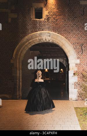 Bal masqué vénitien dans un château médiéval belge Alden Biesen Banque D'Images