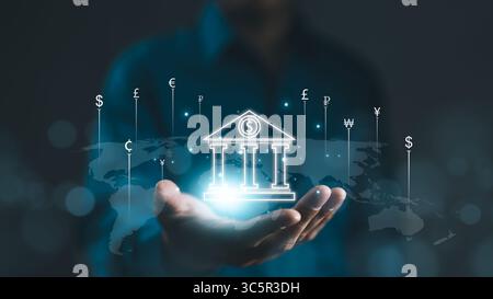 Concept global de change de devises. Homme d'affaires détenant la banque virtuelle avec dollar yuan yen euro rouble livre sterling. Banque centrale en ligne, interbanque p Banque D'Images