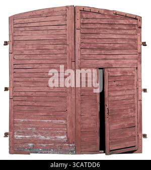 Les personnes âgées isolées de la porte rouge en bois ancienne rétro fire brigade shed. La petite porte est partiellement ouverte Banque D'Images