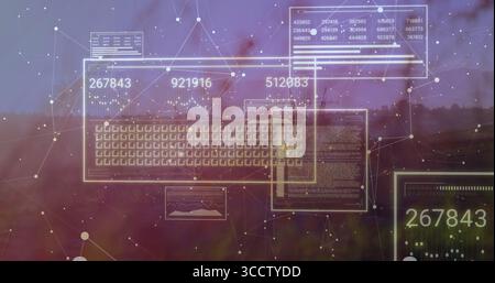 Projection d'une grille de clavier holographique, de panneaux numériques et de nœuds de réseau au-dessus de la limite des arbres floue au crépuscule Banque D'Images