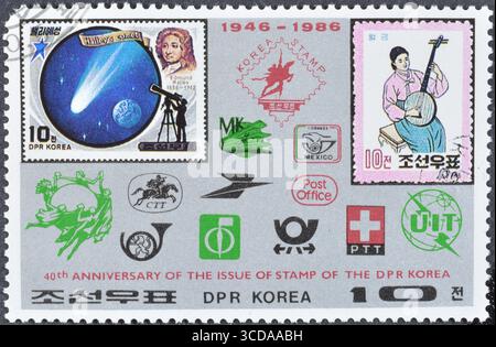 Timbre-poste oblitéré imprimé par la Corée du Nord, qui montre les timbres nord-coréens Mi Nr. 2676 et 376, 40ème anniversaire des timbres nord-coréens Banque D'Images