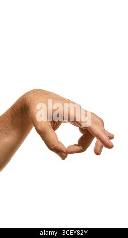 Main humaine avec le pouce et le milieu formant une forme circulaire ouverte en vue latérale Banque D'Images