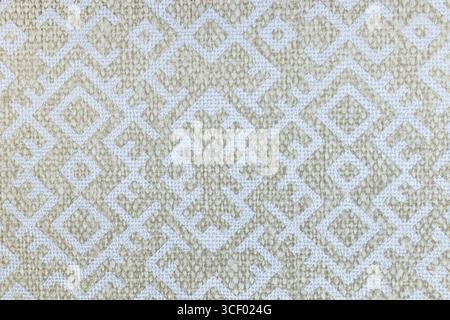 Texture de tissu tissé neutre avec motifs de diamant, motif de tapis bohème ethnique Banque D'Images