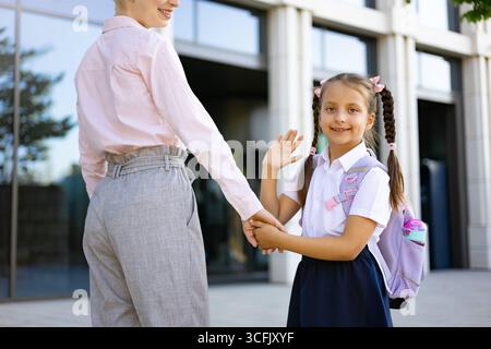 Maman et fille à l'école Banque D'Images