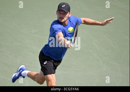 New York, États-Unis. 26 août 2025. David Goffin, de Belgique, joue contre Quentin Halys, de France, lors de la 1ère ronde masculine de l'US Open de Tennis 2025 au Centre national de Tennis Billie Jean King de l'USTA à Flushing Meadow-Corona Park, dans le Queens borough de New York, NY, le 26 août 2025. (Photo par Anthony Behar/SipaUSA) crédit : Sipa USA/Alamy Live News Banque D'Images