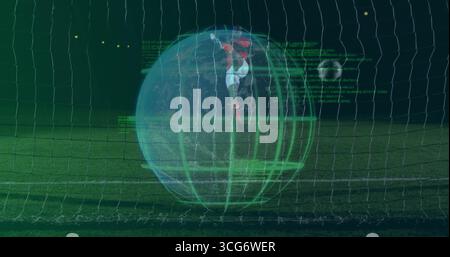 Gardien de but sautant dans un kit rouge plongeant vers le ballon de football dans le filet du stade, avec superposition de grille numérique Banque D'Images